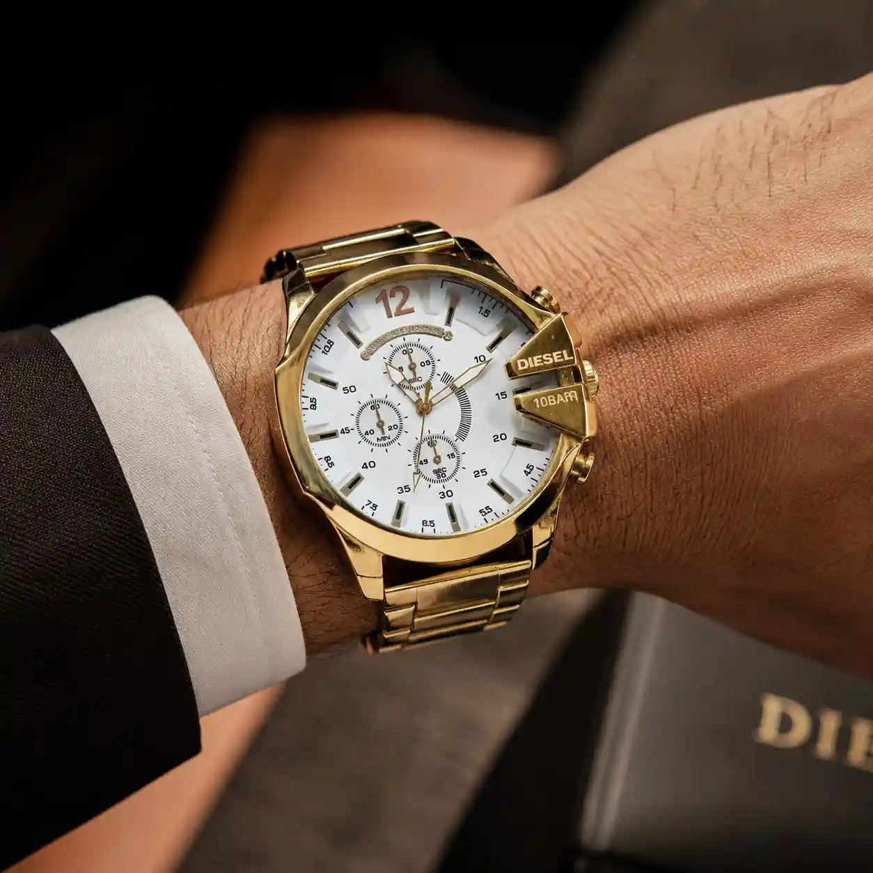ساعت مچی DIESEL مردانه طلایی صفحه سفید مدل U700